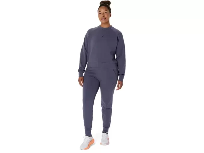 Dzianinowa bluzka z okrągłym dekoltem zapewniająca swobodę ruchów Dzianinowa bluzka z okrągłym dekoltem zapewniająca swobodę ruchów