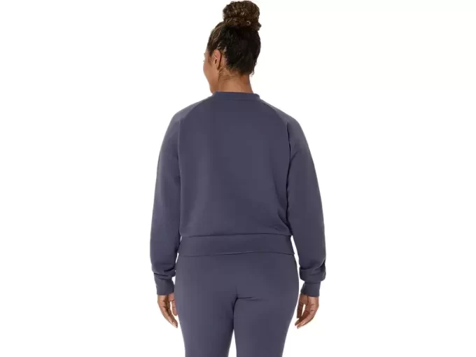 Dzianinowa bluzka z okrągłym dekoltem zapewniająca swobodę ruchów Dzianinowa bluzka z okrągłym dekoltem zapewniająca swobodę ruchów