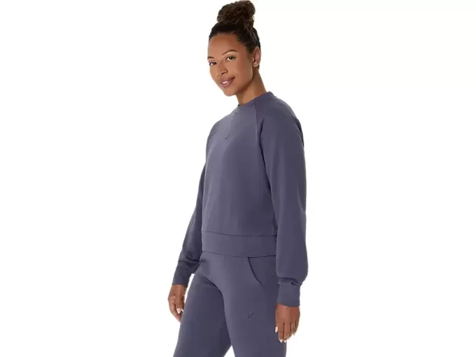 Dzianinowa bluzka z okrągłym dekoltem zapewniająca swobodę ruchów Dzianinowa bluzka z okrągłym dekoltem zapewniająca swobodę ruchów